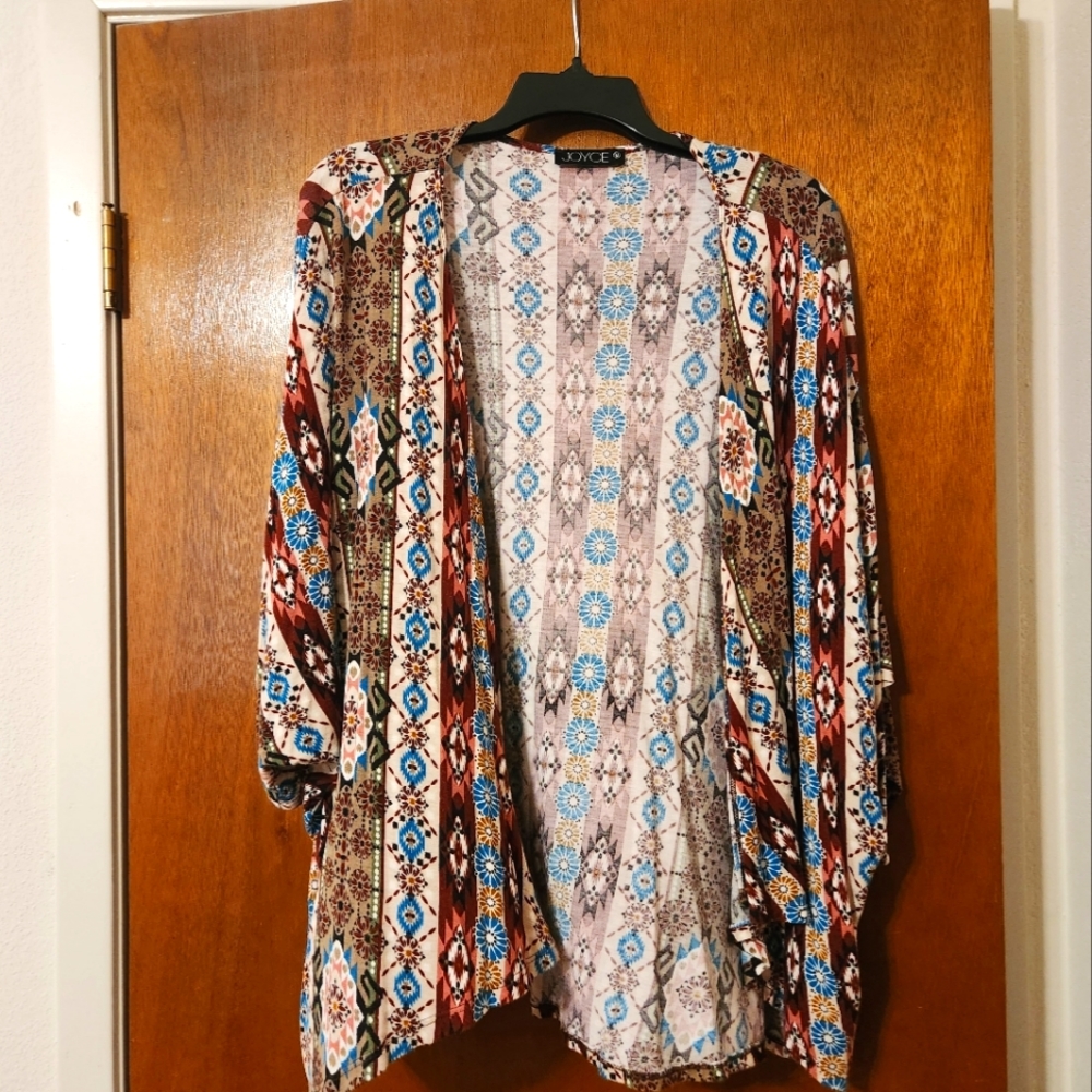 Multicolor pattern cardigan. Size medium, loose fit/flowy